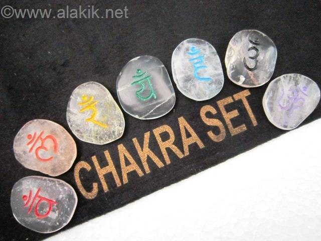 Picture of Crystal Quartz chakra Colour Sanskrit palmstone Set with velvet purse